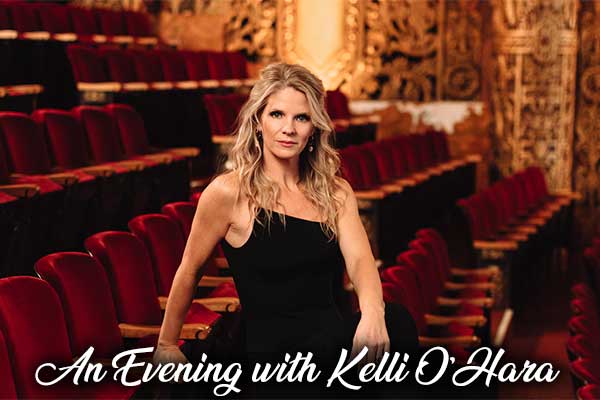 Kelli O'Hara sitting in the chairs of the house